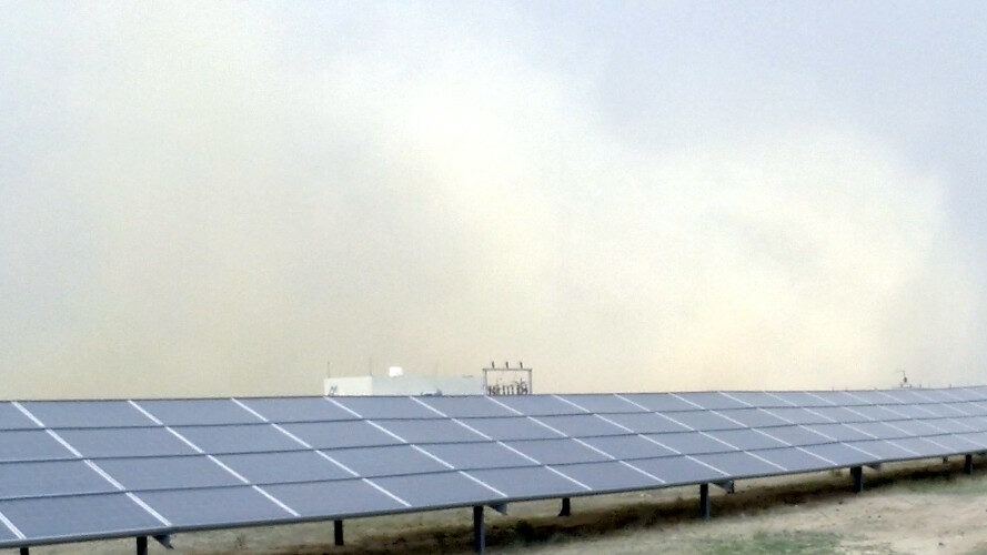 Sand and Dust Storm approaching solar power plant